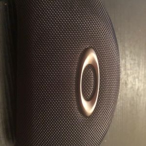 Black Oakley sunglasses case
